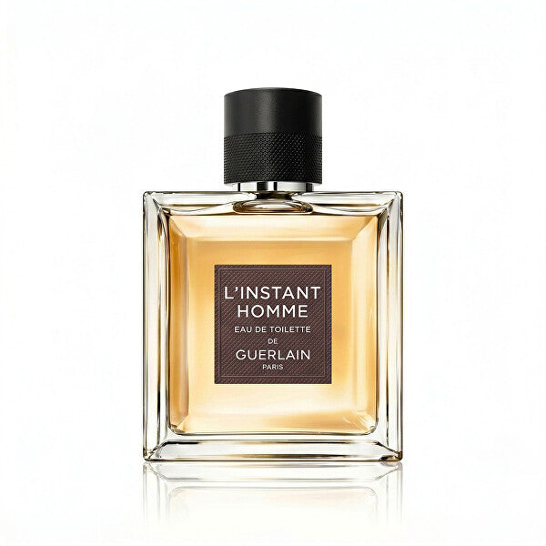 L'Instant de Guerlain pour Homme, flacon avec son étui doré caractéristique.