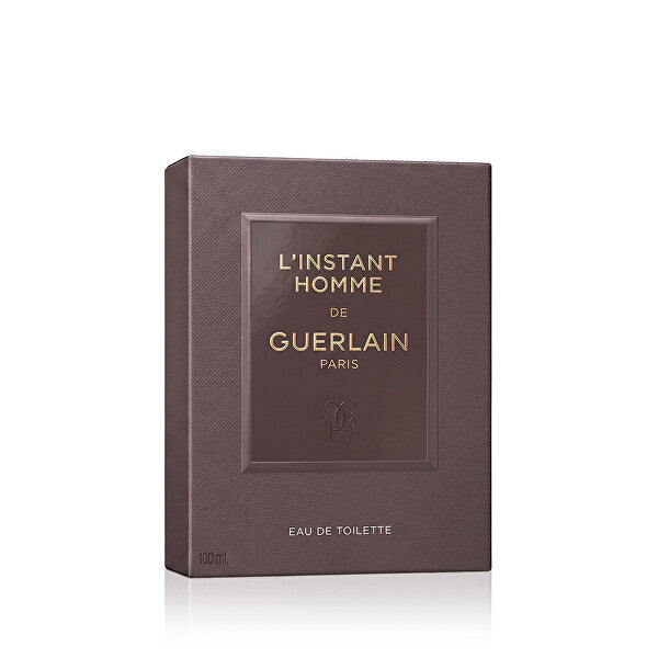 L'Instant de Guerlain pour Homme, vue rapprochée du bouchon et de l'étiquette.